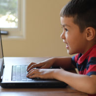 Kindergarten: Paul warms up for kindergarten by doing Typing Club.