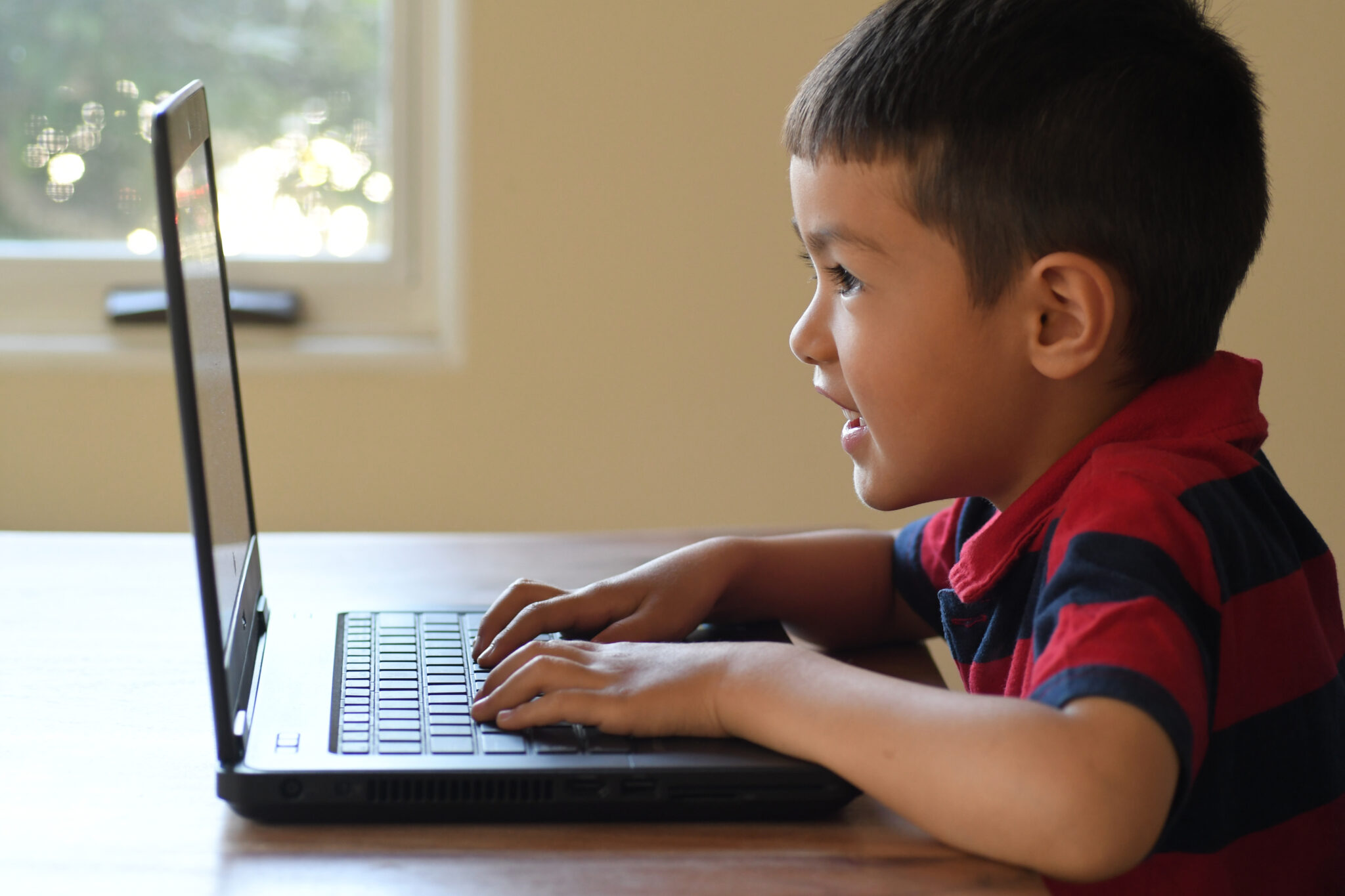Kindergarten: Paul warms up for kindergarten by doing Typing Club.