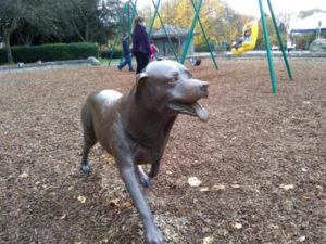 Statue of Carl, from the Alexandra Day books, in Meridian Playground