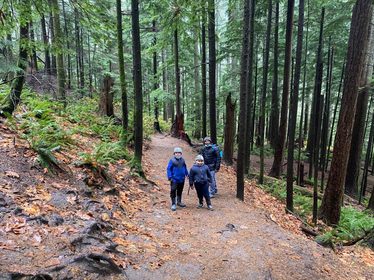 Father and sons on the trail in Olallie State Park