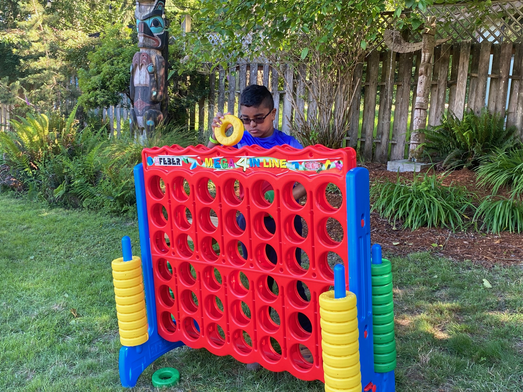 Child playing Connect Four