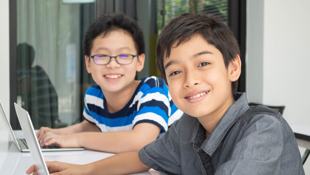 Cascade Enrichment - Students smiling at the camera