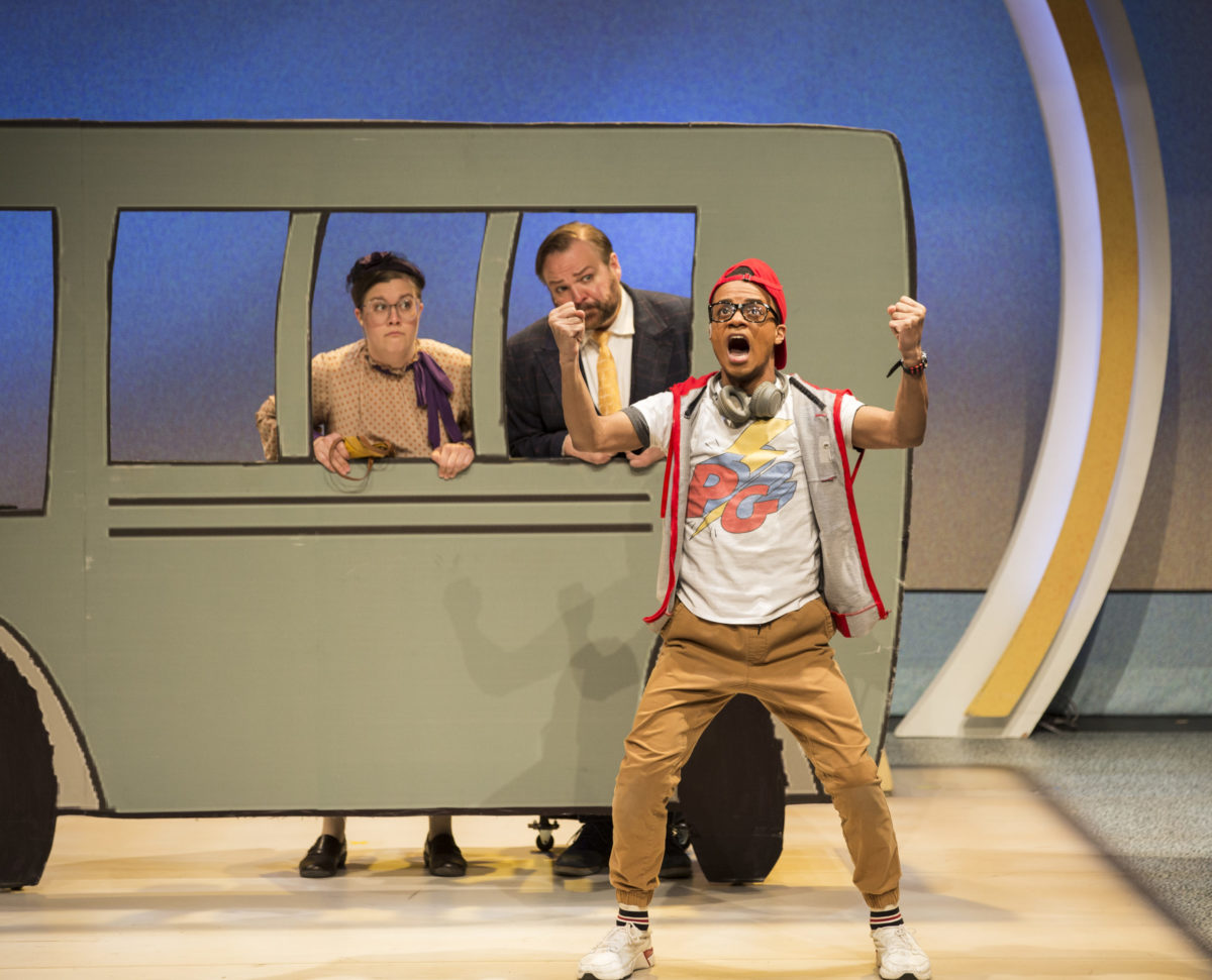 Nigel Rowe belts out a line before getting on the bus.