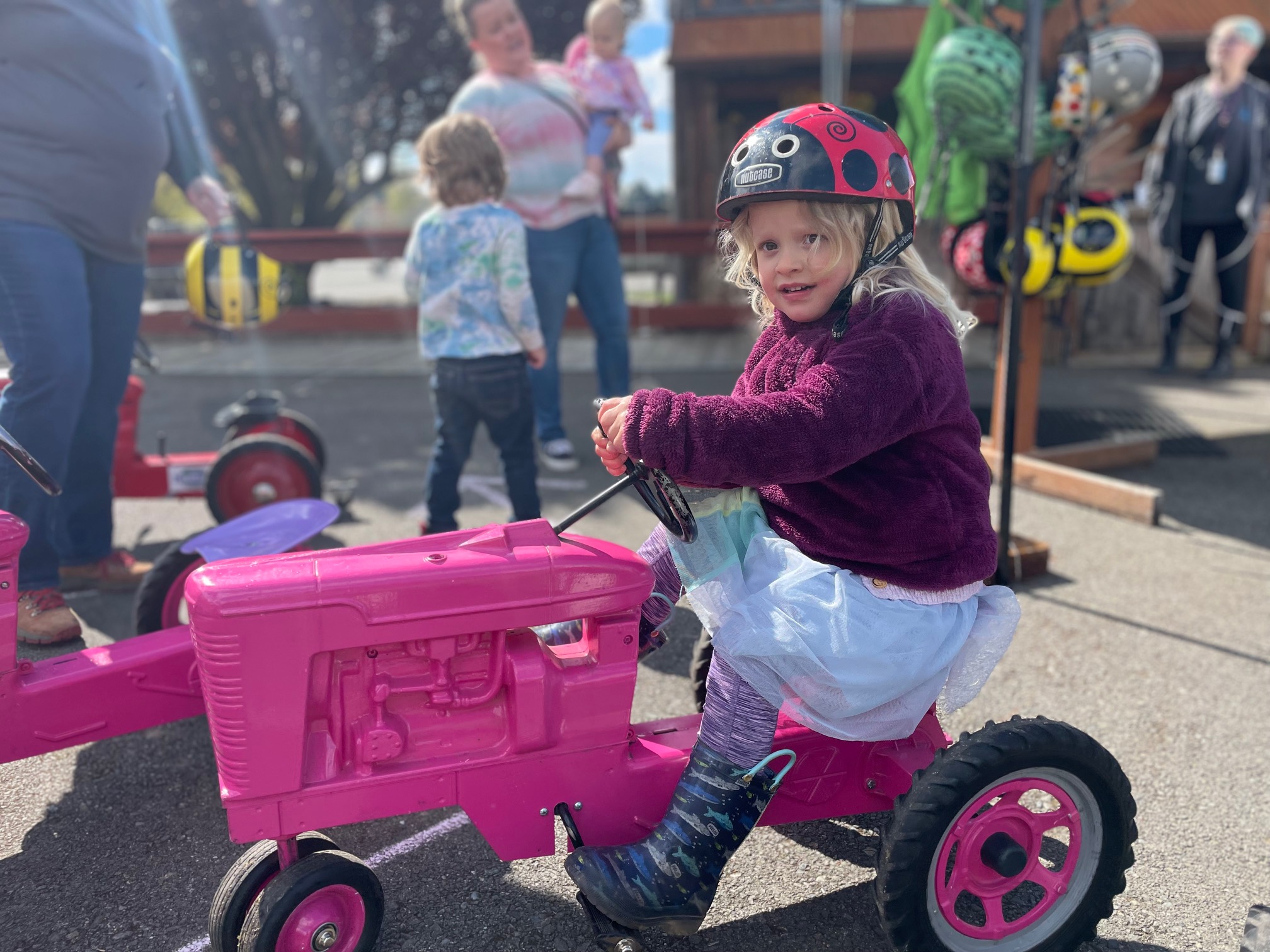 Ride the trikes at the Spring Fair.