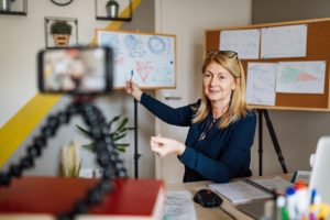 Teacher instructing students via video