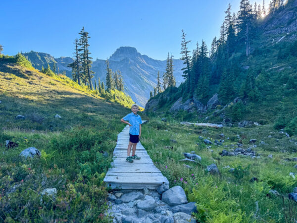 Child hiking on Bagley Lakes Loop trail at Mount Baker