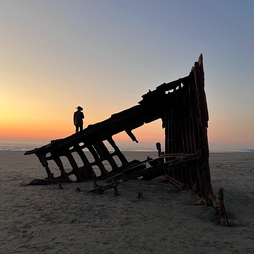 Travel to Astoria, Oregon and see shipwrecks on the beach.