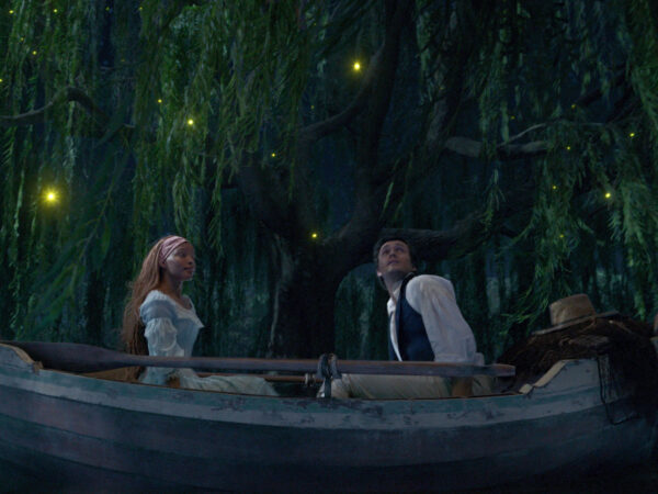 Ariel and the Prince in a boat enacting the popular song "Kiss the Girl"