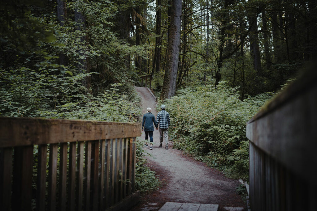 Couple walking on a trail in Vancouver, Washington
