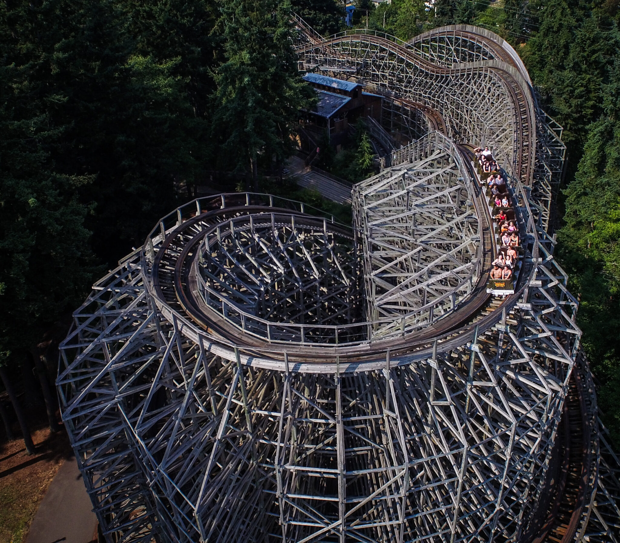 An aerial photo of a very high roller coaster.
