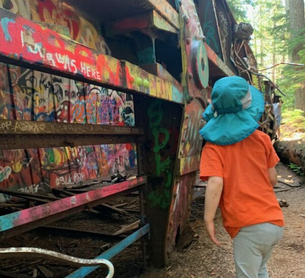 Hike to the crashed trains with graffiti all over them in Whistler.