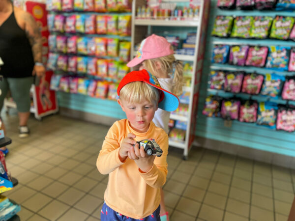 Children picking toys and candy at the candy store