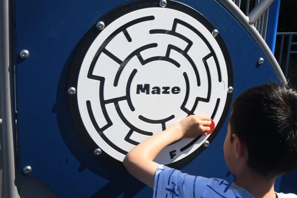 Low-to-the-ground games like a maze are easily accessible for all ages.