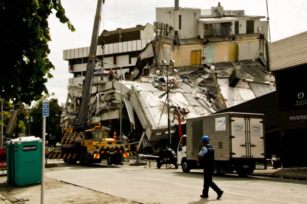 Building crumpled by earthquake damage