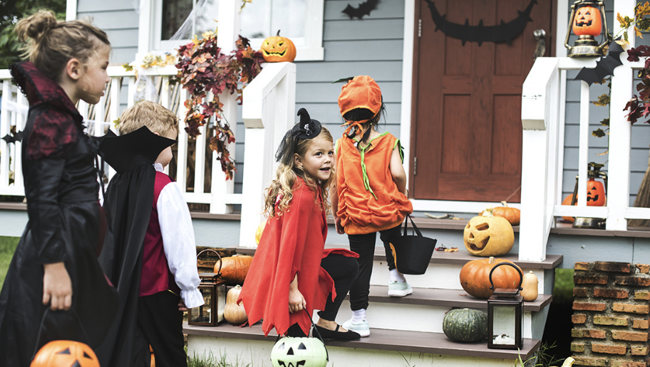 Kids in costumes trick-or-treating during a free Halloween event in Seattle.