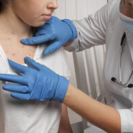 Child getting vaccinated against measles, MMR shot prevention