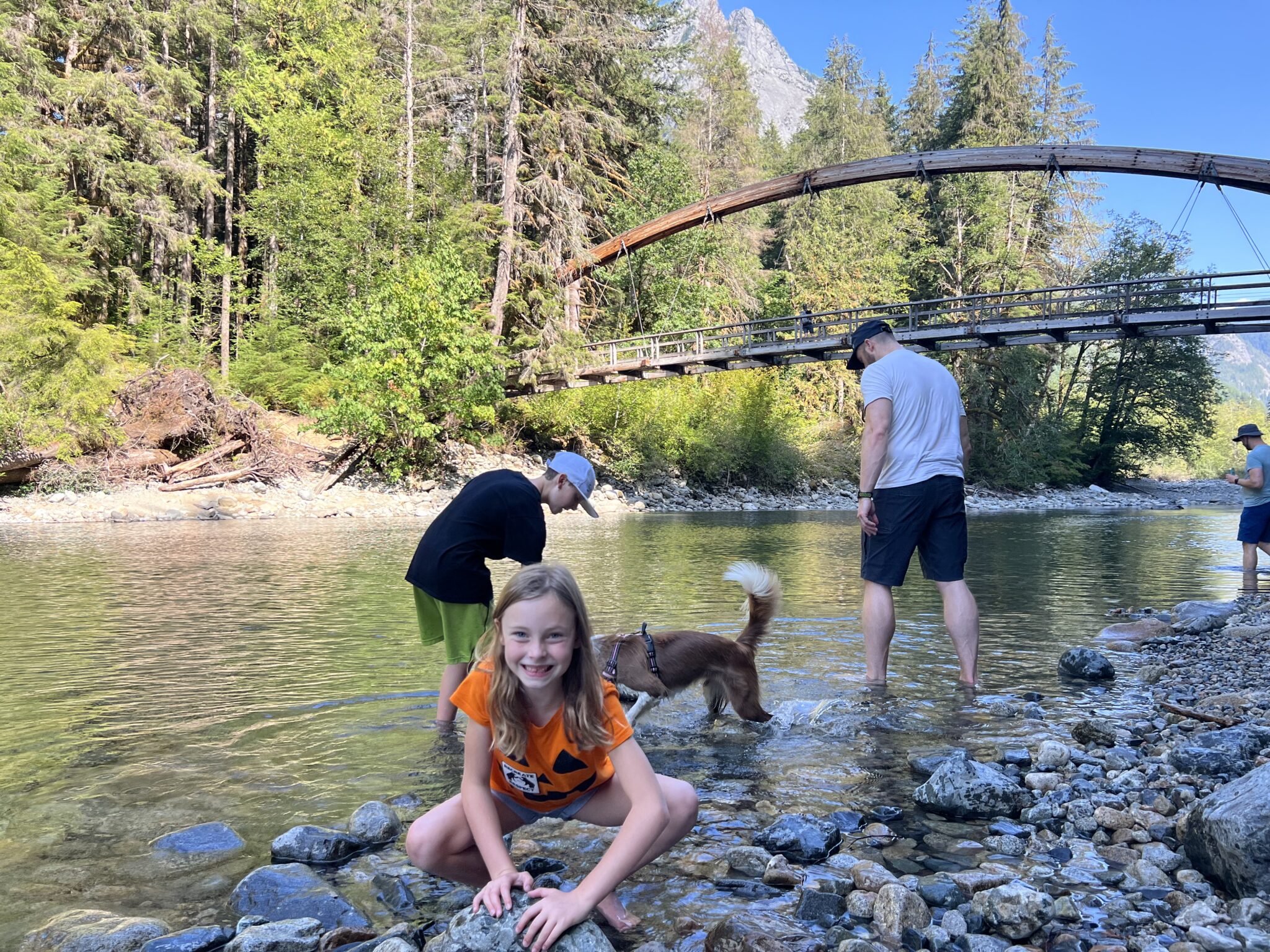 Kids playing in mountain lake