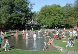 Green Lake Wading Pool on a hot summer day full of waders.