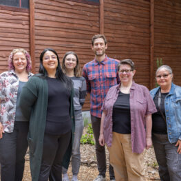 Group photo of the Perinatal Support Washington Warm Line team, including volunteers and staff who support parents experiencing pregnancy loss or postpartum struggles.