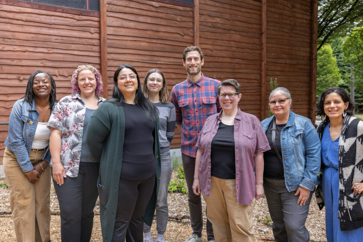 Group photo of the Perinatal Support Washington Warm Line team, including volunteers and staff who support parents experiencing pregnancy loss or postpartum struggles.