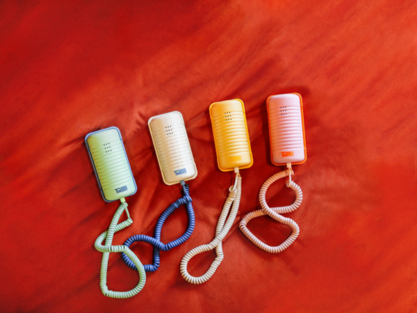 Close-up of Tin Can phone with bright colors