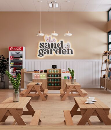 Cozy seating area for parents overlooking The Sand Garden indoor sandbox.