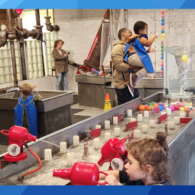 Children explore the exhibits at Imagine Children’s Museum in Everett, surrounded by colorful, hands-on play spaces.