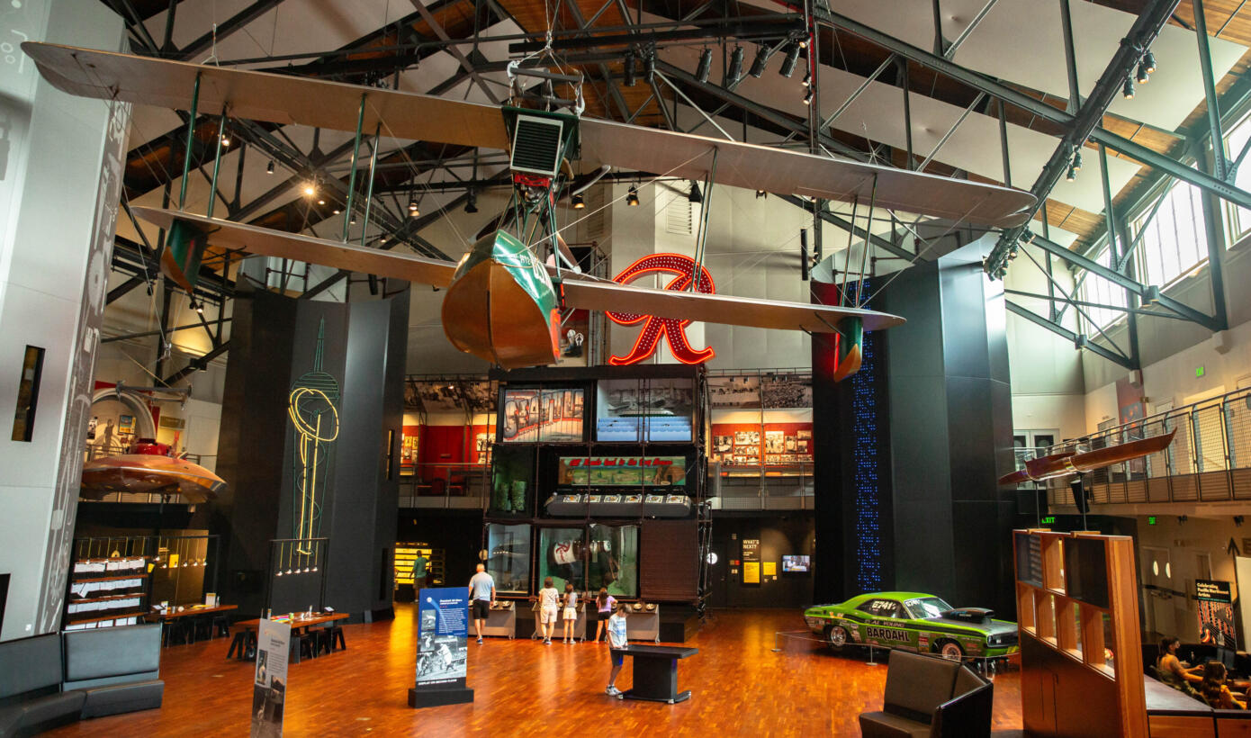 Inside the Museum of History & Industry (MOHAI) in Seattle, with the vintage Boeing seaplane hanging overhead.