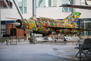 Full view of beaded MiG-21 fighter jet on display at Museum of Flight