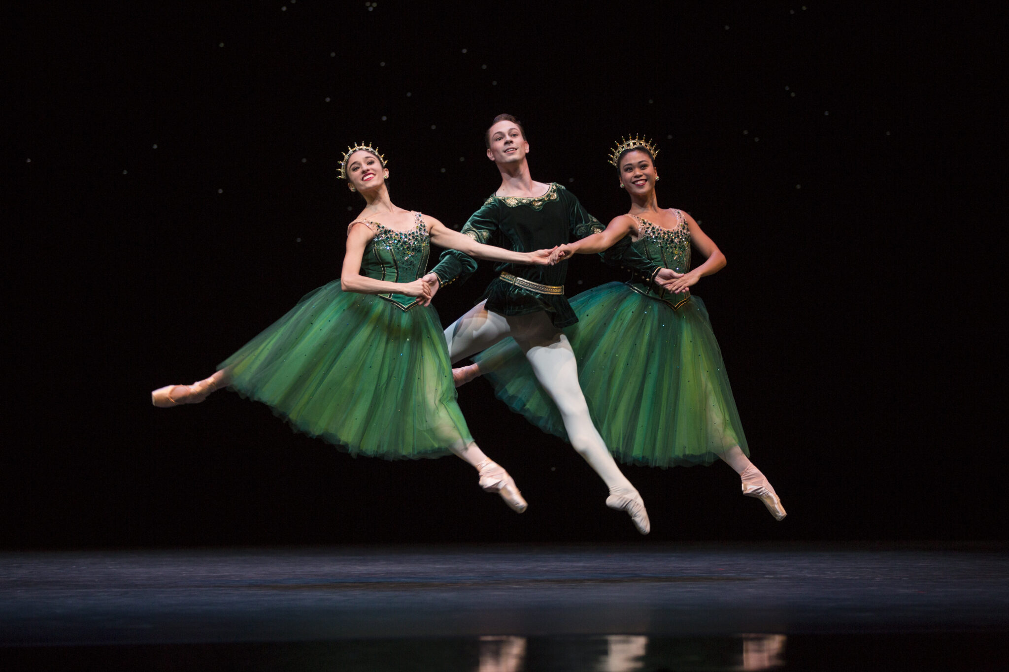 Dancers perform George Balanchine’s ballet “Jewels” in elaborate costumes.