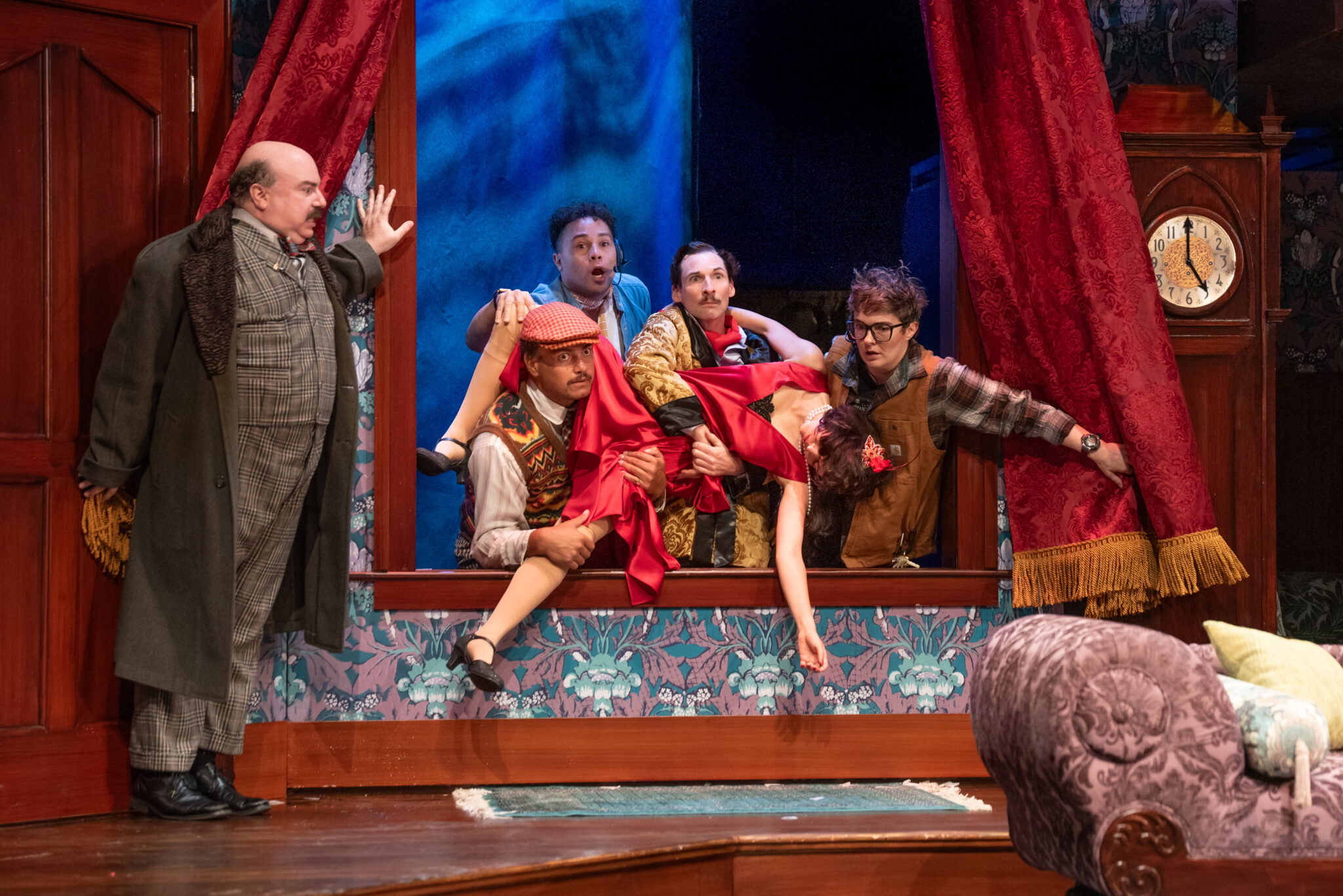 Cast members perform physical comedy in “The Play That Goes Wrong” at Seattle Rep.