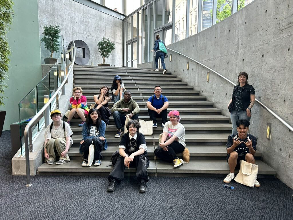 Youth-curated art exhibition “You, Me, & Everything Between Us” on display at King Street Station in Seattle.