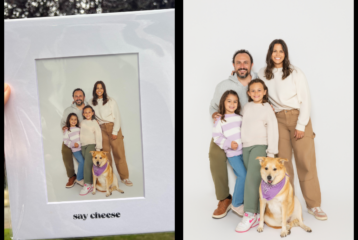 A family of four and their dog posing together in a printed portrait from Seattle’s Say CHEESE selfie studio, held up outdoors in its white photo mat.