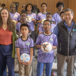 Seattle Mayor Katie Wilson with members of the Somali Health Board soccer team (Image: Seattlefwc26)